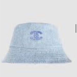 CHANEL Denim Sequin Reversible Bucket Hat in Blue.